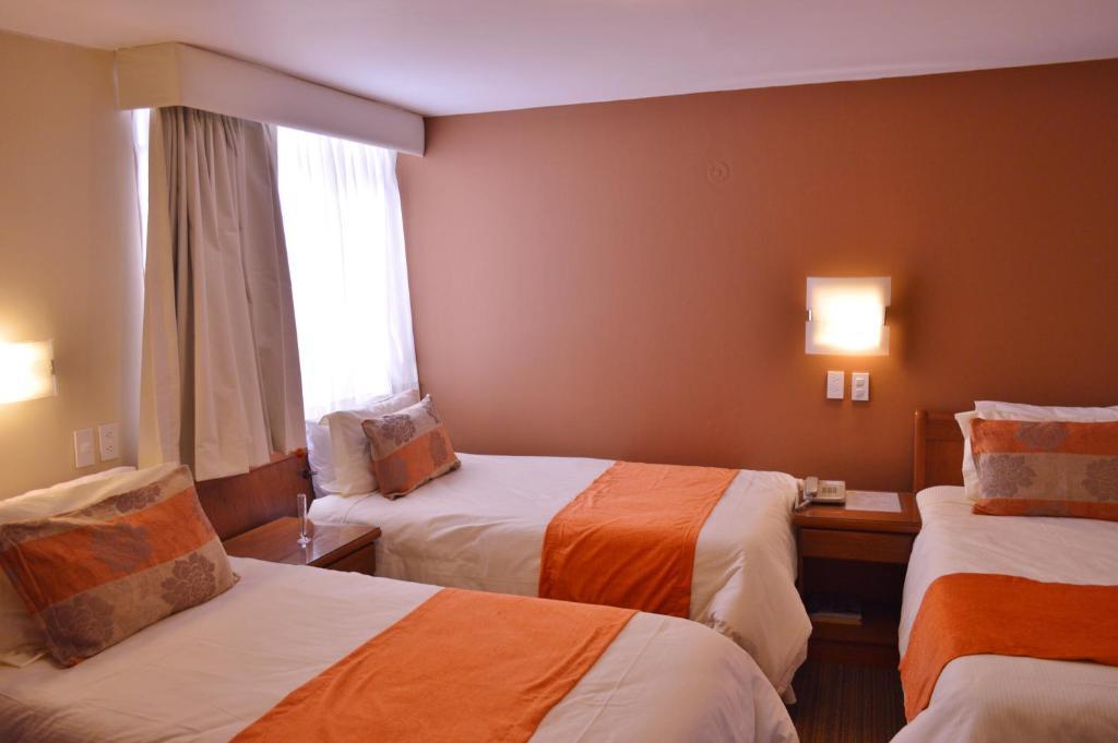 La Carolina Inn Quito Phòng bức ảnh